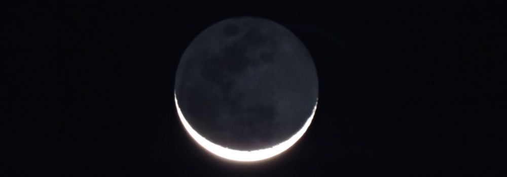 Waning Crescent MoonRising and Two Hands High
